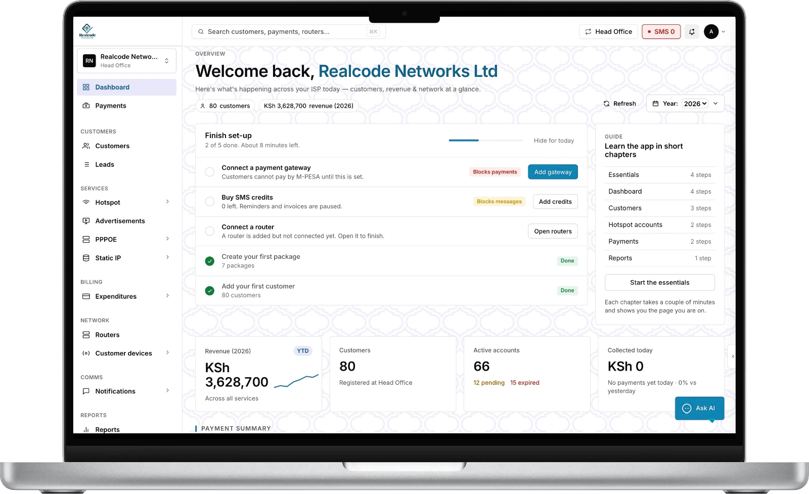A MacBook showing the RNLISP360 dashboard with the Finish set-up checklist and account totals